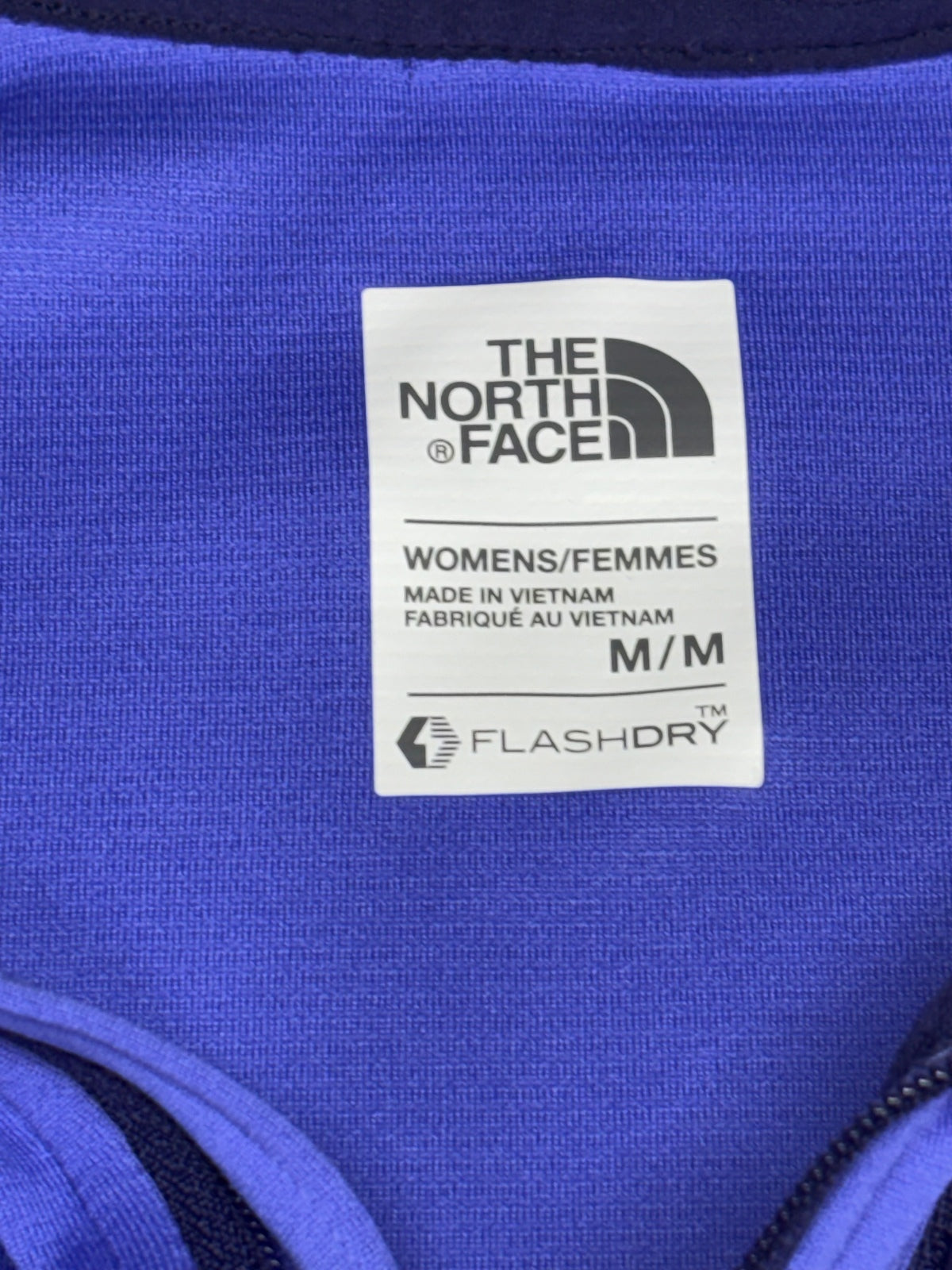 The North Face women's purple running 1/4-zip long sleeve top Performance