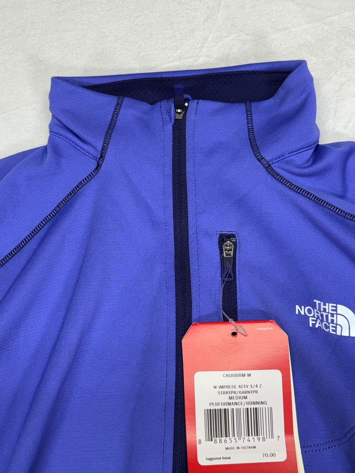 The North Face women's purple running 1/4-zip long sleeve top Performance